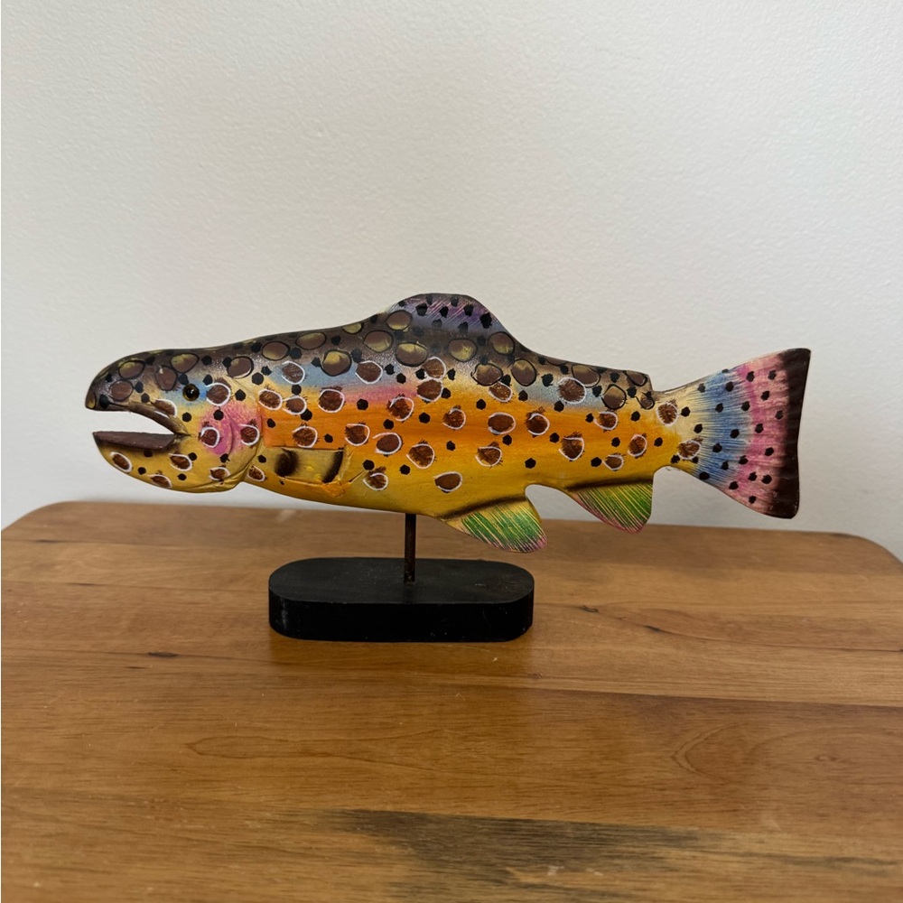 Vintage hand-carved and hand-painted wooden brown trout figurine on a stand